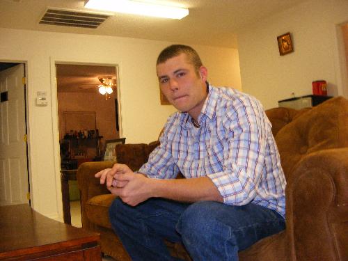 James sitting in the livingroom of his dorm - John 3:16 ministries, CHarlotte, Arkansas. This is a spiritual boot camp for men with drug and alcohol addictions.