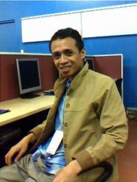 me - This picture was taken from our production area in our office. I am Financial Analyst tasked in keying and analyzing annual returns and financial statements of companies coming from the United Kingdom.