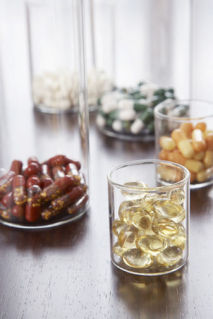 Diet Supplements - This is a photo of dietary supplements in little glasses.
