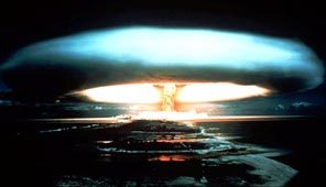 Mushroom cloud of detonated nuclear bomb at the Mu - Mushroom cloud of detonated nuclear bomb at the Mururoa Atoll by France at the Mururoa Atoll in French Polynesia in the Pacific Ocean in 1971. 