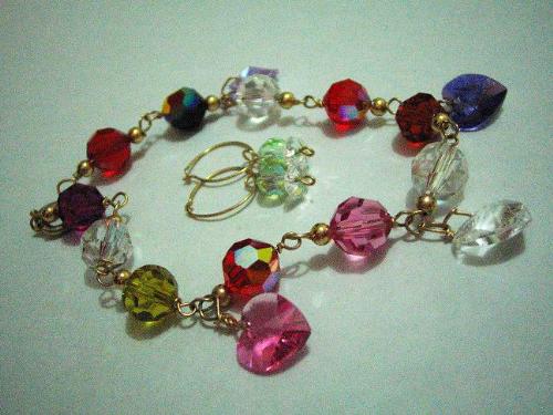 Swarovski Stones - It's fun to make sparklers! Purely handcrafted with 10k (1420 gold wire)and genuine swarovski stones. I make bracelets, earrings, rings and pendants of different designs.