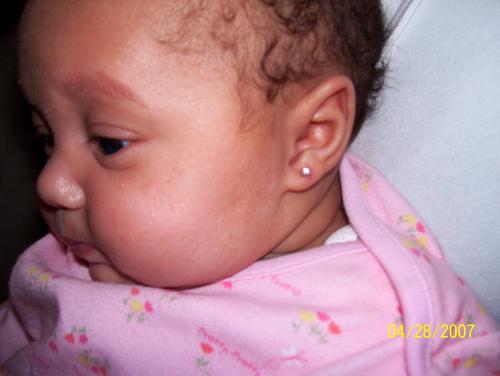 baby with pierced ears - Not my idea of great parenting