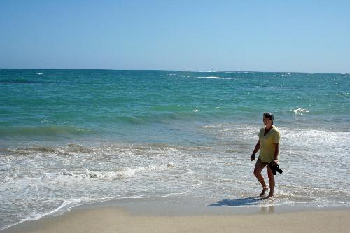 Donna takes a stroll - in the surf.