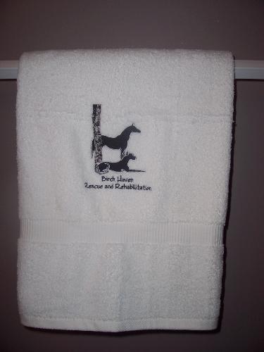 Birch Haven Rescue - These towels carry the logo of a great organization that rescues dogs and horses and finds them homes. Digitizing is another application we do. If you have a picture in mind and you want to put it on a hat, coat, or tote bag we can take that design, digitize it and put it on anything you like.