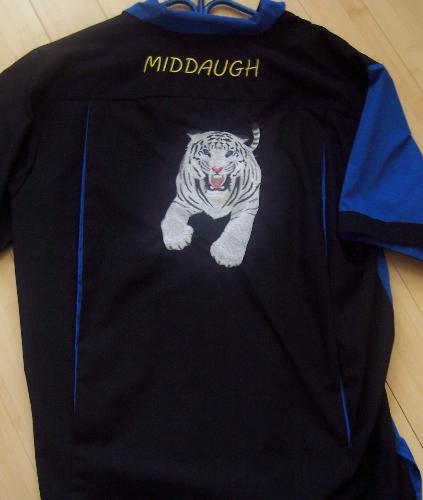 Dart Shirt - Dart and Bowling Leagues are great organizations that love to show their spirit for their sport. Teams get a logo, their team name and players name on shirts to advertise their team and show their spirit.   This white tiger is my son's trademark. The ideas are endlist.