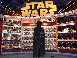a star wars fan and his collection - a very large collection of Star Wars toys