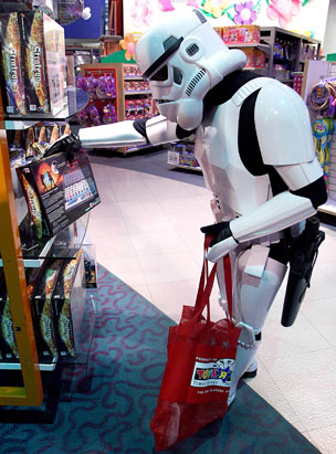 Storm Trooper picking up toys - a Storm Trooper going shopping