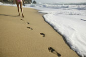 walking - Woman walking on beach