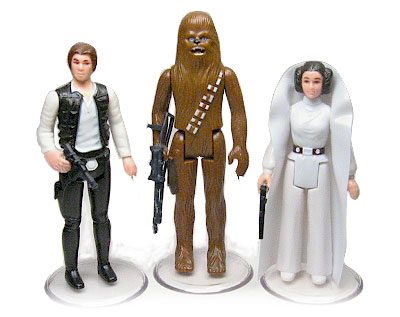 Three Star Wars figures - Han Solo, Princess Leia and Chewbacca
