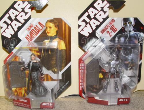 two star wars figures - two boxed star wars figurines