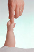 mom - Child Grasping Mother`s Finger