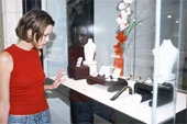 shop - Woman looking in a jewellery shop window