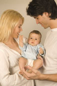 parents - Parents holding their baby.