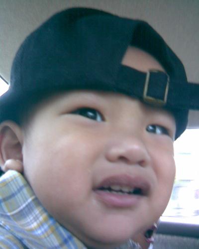 Cap Maturity - A young boy at the age of 2 years
