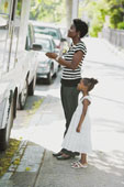 truck - Mother and daughter by an ice cream truck