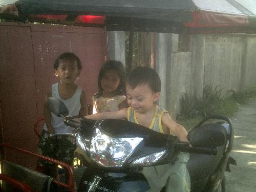 Learning To Ride - Thats my son who loves to ride on this motorbike.