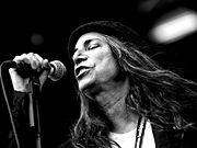 Singer - A singer singing in a concert.