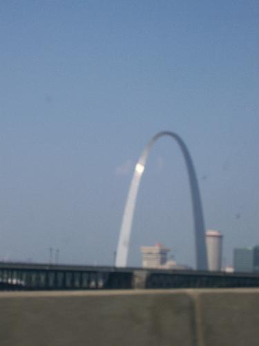 St. Louis Arch - This is a picture I took from my car when we were driving through St. Louis, Missouri. It is the famous St. Louis Gateway Arch. It is a tremendous 630 feet tall and the tallest man-made structure in the United States and the construction was completed on the monument in 1965.