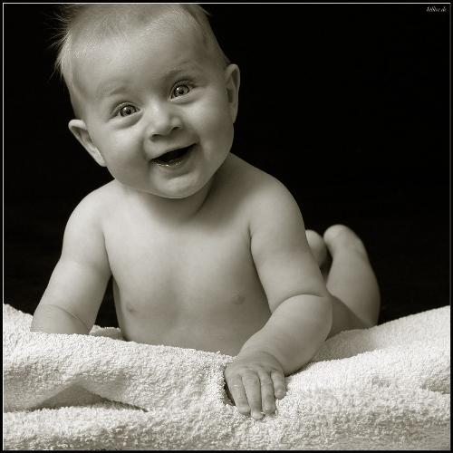 a delighted little baby - a very happy little baby