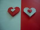 Paper Hearts - Two paper hearts, red and brown.
