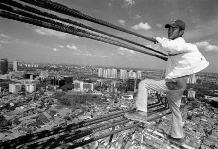 Indonesian Superhero - This is indonesian Superhero, just like spyderman but they not using mask and have no syder web. You can saw them in each corner of Jakarta which has building construction. They have no security equipment and have no fear at all