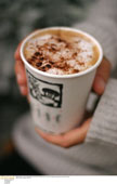 Coffee - Still life image of a cup of coffee with foam and cinnamon sprinkled