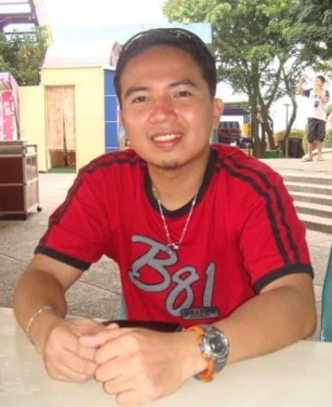 Me at Janfousan Amusement Park, Taichung, Taiwan - Just relaxing after the scorching heat.