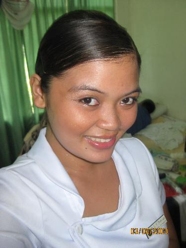I'm a BSN! - I got all tanned up for my Nursing Pinning Ceremony.. Mom and I did the makeup and my hair.. I looked like a tanned, bronzed Malibu barbie afterwards! =)