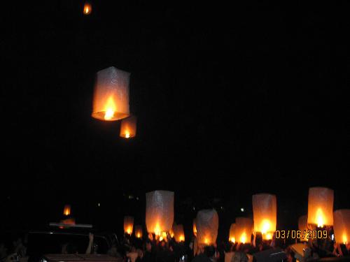 Lantern lighting - These cool, waxpaper 'lanterns' went up powered by hot steam and smoke... These were lighted on the Friday night of my graduation weekend..