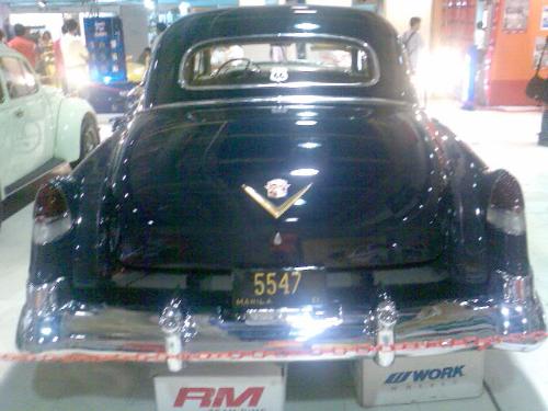 car - Vintage black car, back view