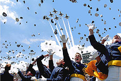 Student - A Traditional Hat Toss during a commencement exercise.