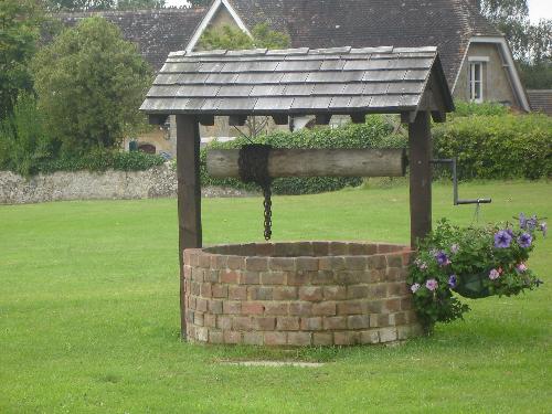 The Reconstructed Well - This is believed to be an old Saxon well which was uncovered whilst digging the foundations for the new cricket pavilion. It's 90 feet deep but a false metal bottom has been inserted close to the top, to save accidents.