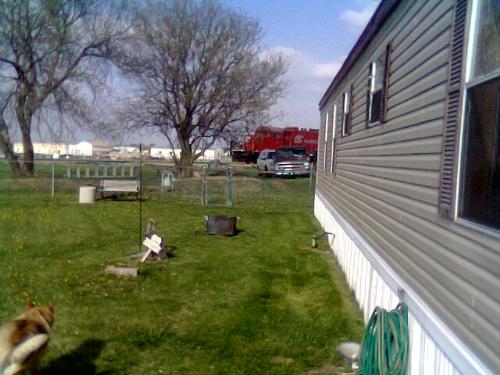 Home Sweet Home - If you look closely you can see the train sitting behind the house.
