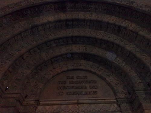 orbs - Orbs gathered around the doorway of a medieval church.