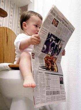 baby - the baby was needed to read anews paper in the bathroom