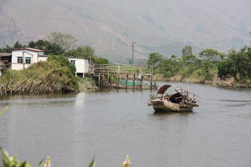 Old boat - An old boat with it's port and a old house, very traditional feeling