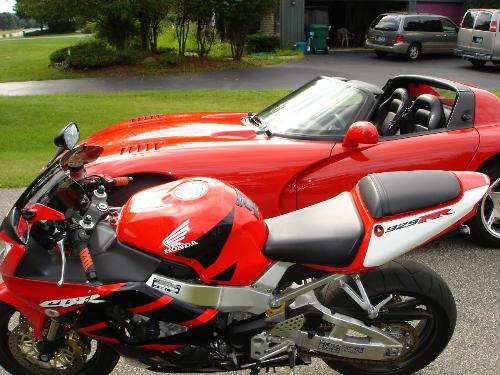 My Viper RT/10 and CBR 929 - I've owned both of these vehicles for many years. Right now Gen II Vipers are extremely cheap $40000 and the CBR 929 around $5k. It's amazing fun for what you can get at the price.   They definitely don't hurt my social life either.