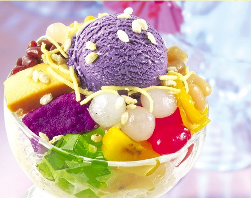 halo halo made in the philippines - halo-halo is made up of crushed ice, evaporated milk, sugar, sweetened beans, nata de coco or shredded buko meat, sweetened banana, gelatin or sago, sweetened jackfruit, ube halea and leche flan.