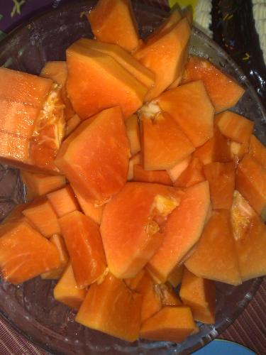 eating food - yummy papaya fruit