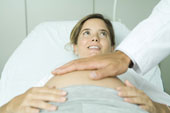 woman - pregnant woman in a doctors office