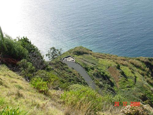 Mountain, sea and road - This photo shows a mountain road and the sea above.