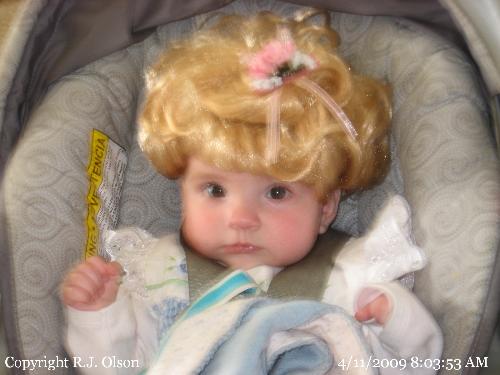 Savanna - My grand daughter wearing a dolls wig.