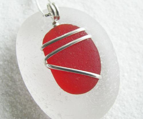 Cherry Red Sea Glass Necklace - My newest red sea glass necklace. I immediately regretted listing this necklace in my shop, and now I&#039;m hoping it does not sell because I&#039;d like to keep it for myself. 
Red sea glass in this flawless condition are not found very often and I doubt I&#039;ll come across another as nice as this one (but I&#039;ll keep searching the beaches)