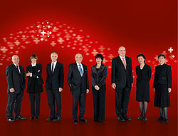 Politics and Governance - The Federal Council of Switzerland, the seven-member collective Head of State of Switzerland, in 2009 (also depicted: Federal Chancellor, far right).