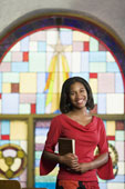 Church - Lady in church with Bible