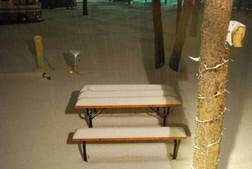 Picnic table in the snow - Photo was taken on 04/16/2009, in Woodland park, Colorado 8500 feet above sea level in the Pikes Peak mountains. Photo taken at about 9:00pm, it had been snowing for about 4 hours at this point, and was already around 6 inches deep or better! Expected snow fall is between 24 and 36 inches! As of the writting of this, (12:00 pm, 04/17/2009, we have about 12 inches or so on the ground, and the snow is still falling!  This is our second Colorado winter, and the reason we moved to the mountains was because God called us up here, and we wanted feet of snow! We finally are getting our feet of snow, and I am going photo crazy!!!