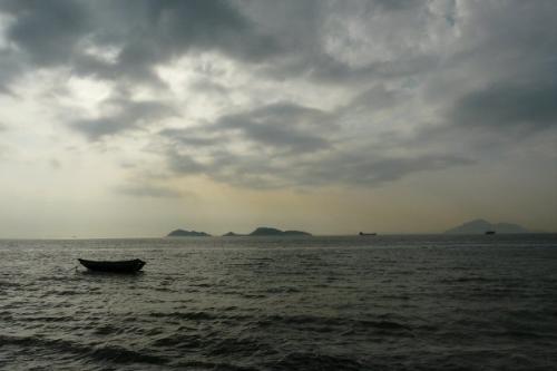 Beach in Hong Kong - photo taken in a beach in Tuen Mum in Hong Kong, the boat there make the pic good