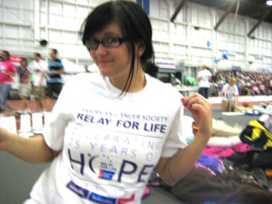 My sis in her racing shirt! - This is my sister in her RFL American Cancer Society participant shirt! This was after the six hours of walking - when we took a break and got ready to go. =)