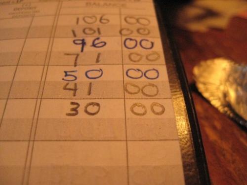 you'd better balance your check book! - Here's a random macro pic of my checkbook - back last month when I got down to $30 in my checking! yikes!