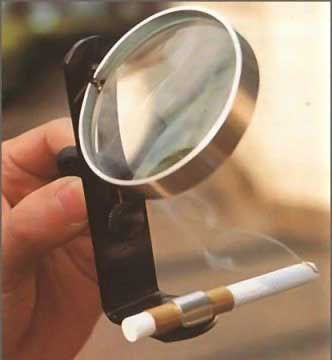 if you don't have a lighter in outside but you als - the picture : you will see a man use a magnifying glass to burn the cigarette.